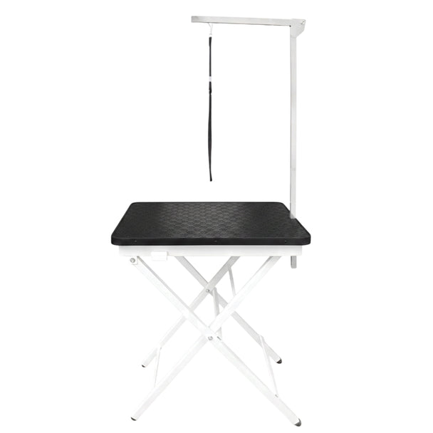 Compact scissor type folding table with plastic tabletop