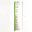 Green reverse crescent comb with measurements on a white background
